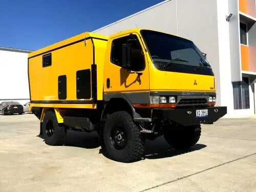 Great Yellow Camper fitted with 37's